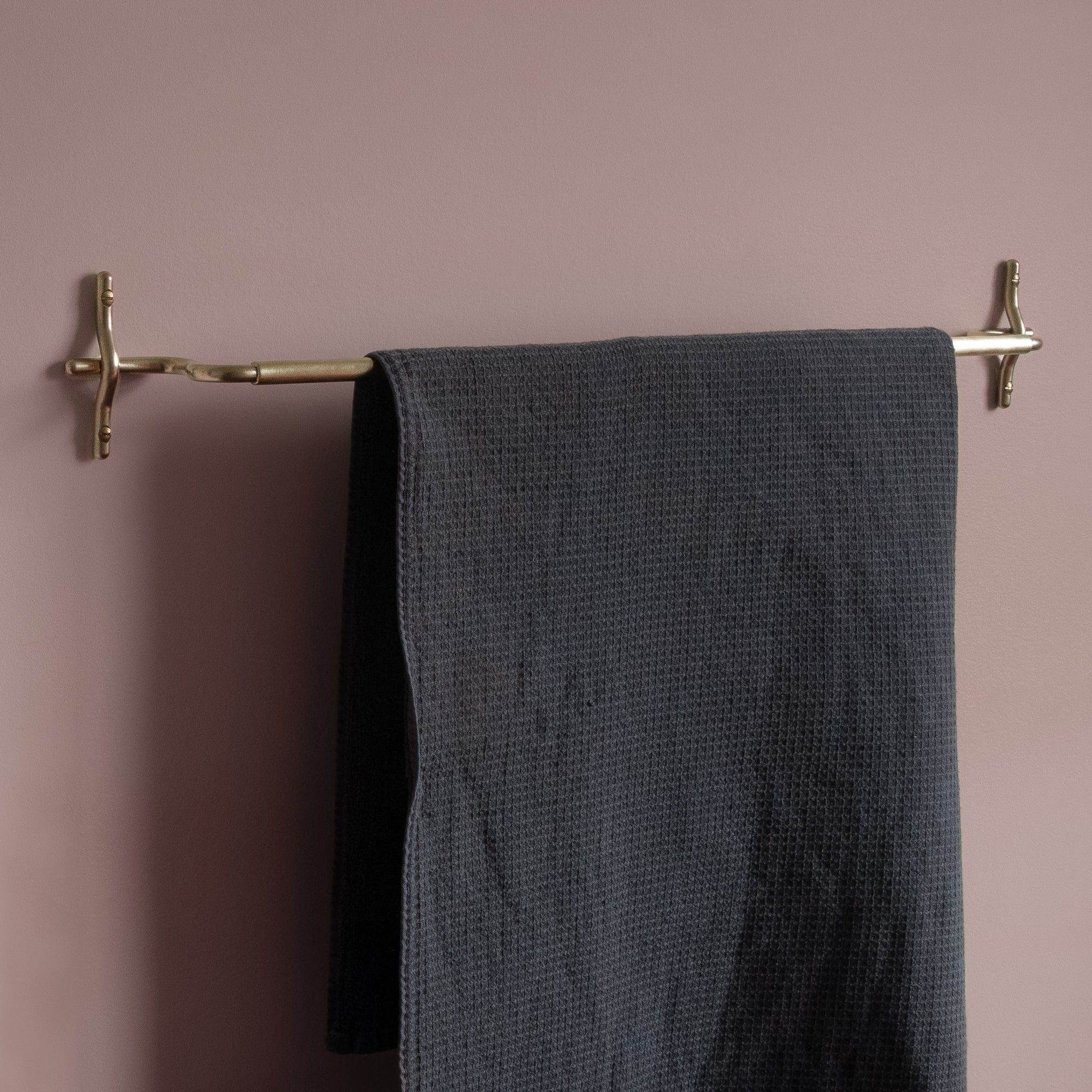 Hand-finished unlacquered brass bath towel bar, made in Vancouver