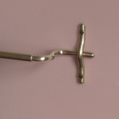 Brass towel bar mounting detail