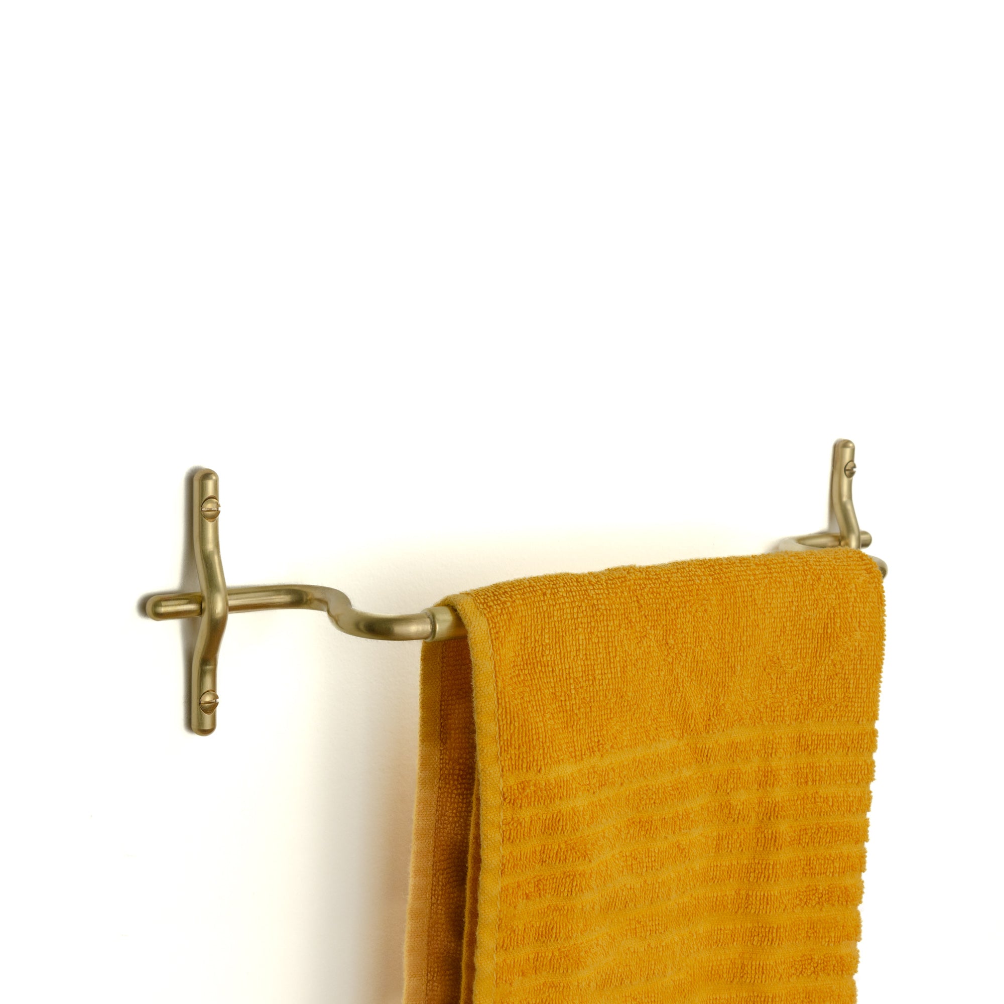 Hand-finished unlacquered brass hand towel bar, made in Vancouver