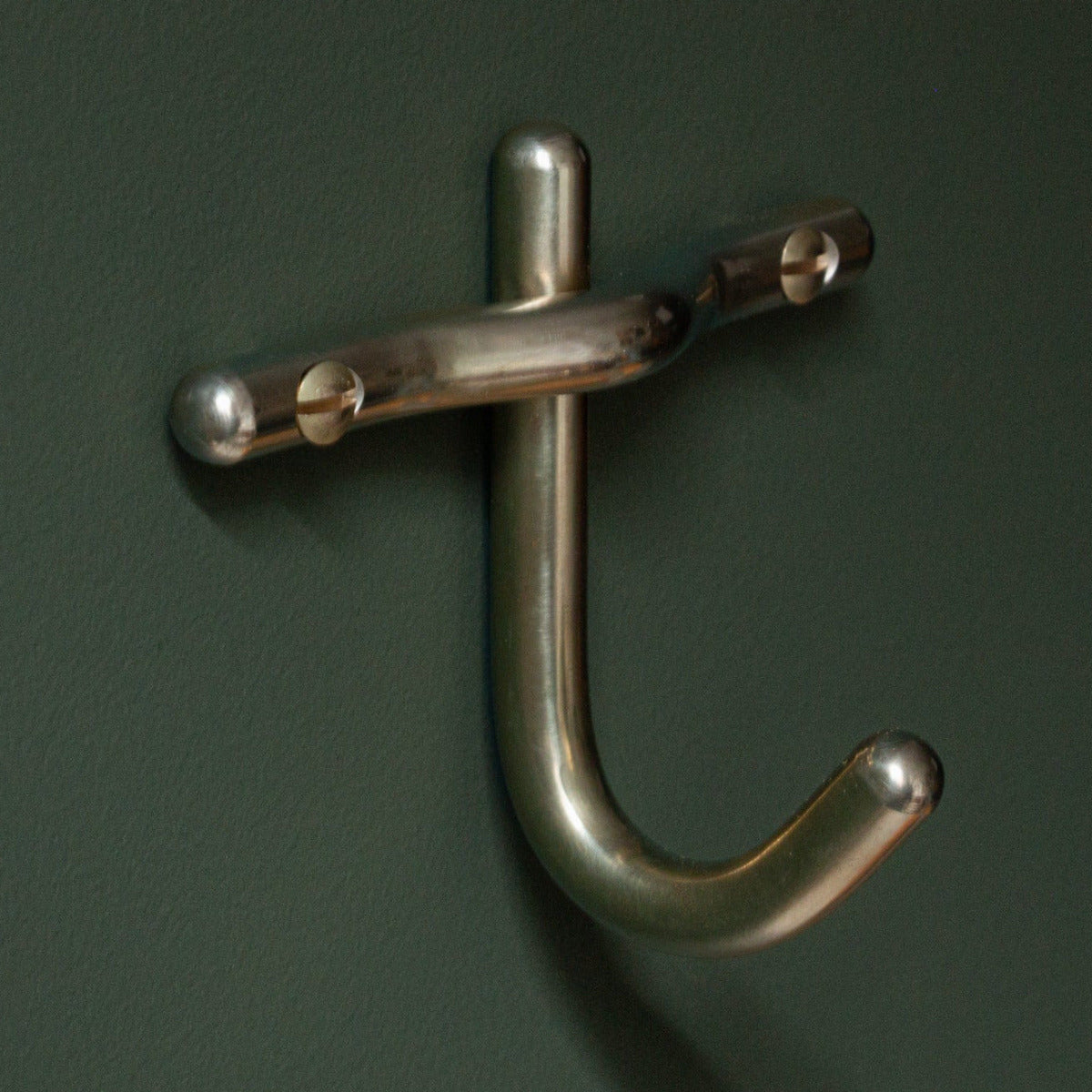 Hand-finished unlacquered brass robe hook, made in Vancouver