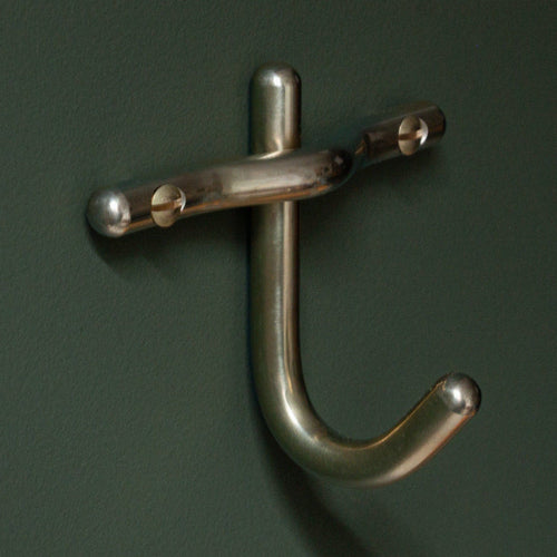 Hand-finished unlacquered brass robe hook, made in Vancouver