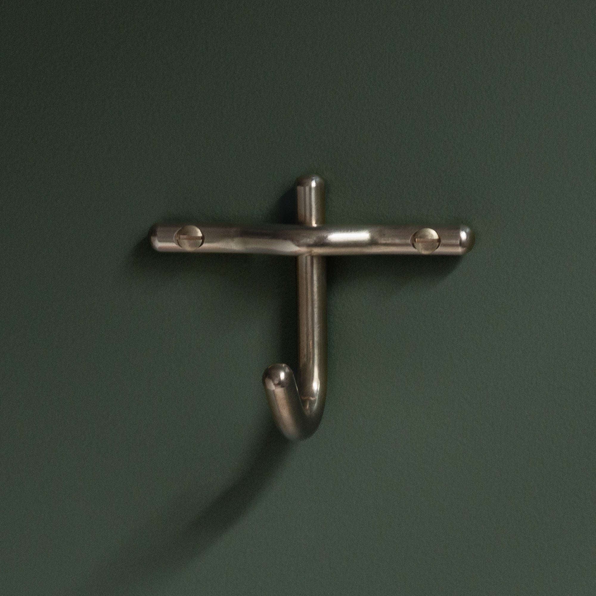 Hand-finished unlacquered brass robe hook, made in Vancouver